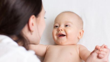 Frau mit Baby